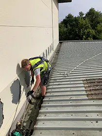 Crosby Industrial Roofing gutter cleaning